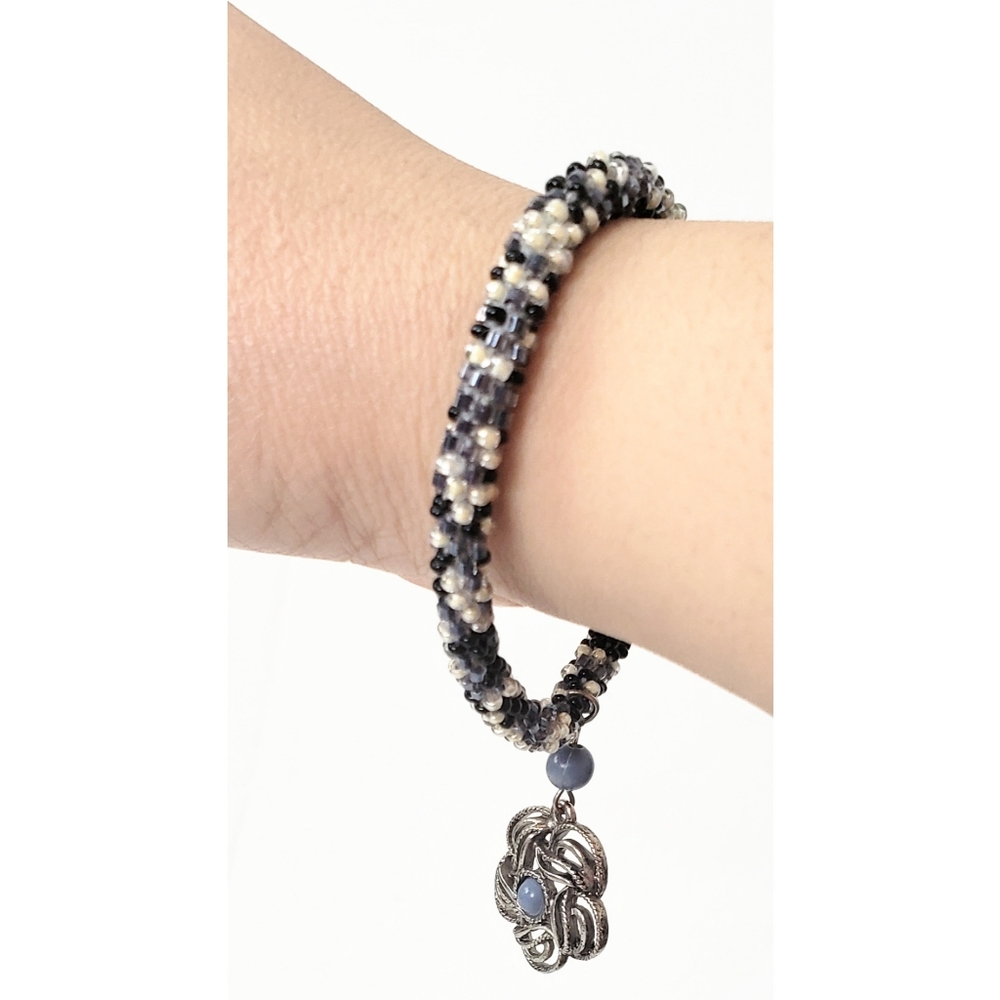 Multi Colored Woven Beads Bracelet Flower Charm